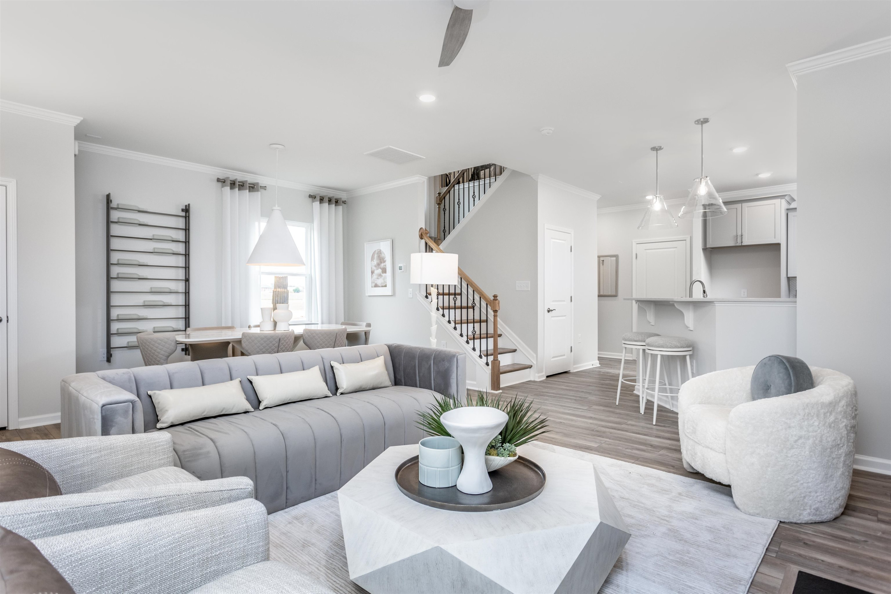 5701 Preveza Place Raleigh, NC 27603 - Photo 7 of 21 a living room with furniture and a wooden floor