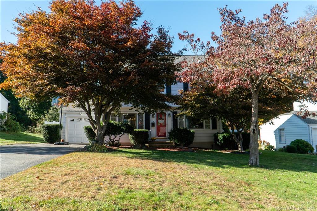 34 Forest Ridge Road Waterbury, CT 06708 - Photo 1 of 1 a front view of a house with a yard