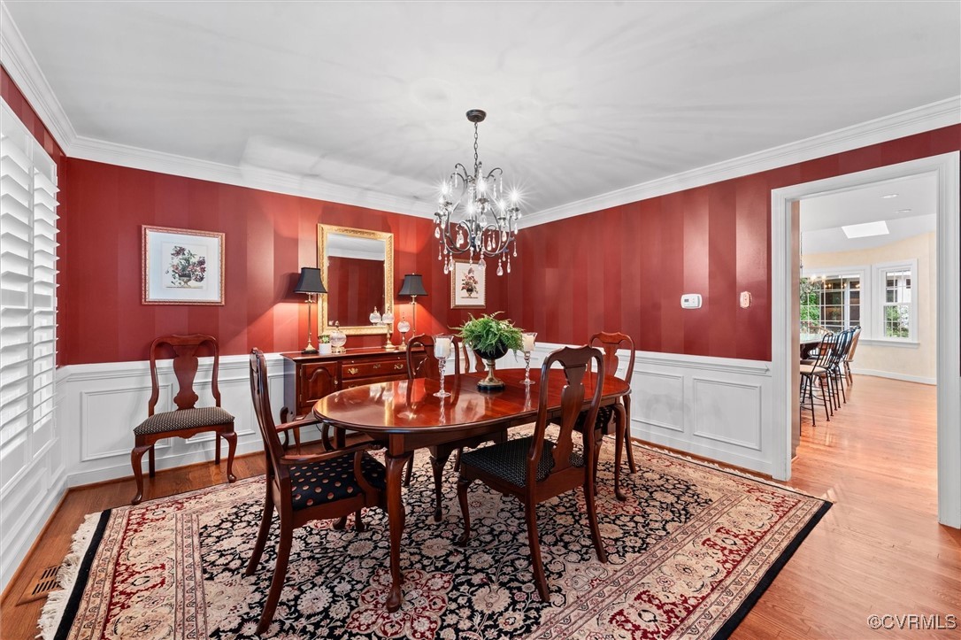 5911 Waters Edge Road Midlothian, VA 23112 - Photo 12 of 50 Dining room featuring a chandelier, light wood-typ