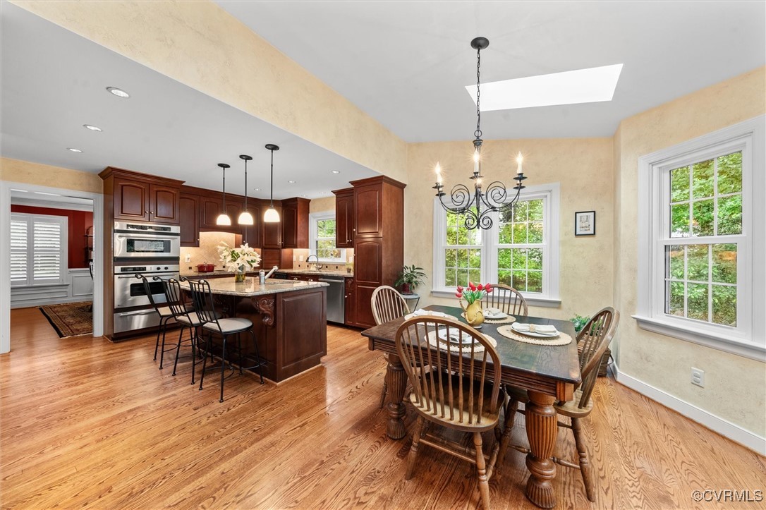 5911 Waters Edge Road Midlothian, VA 23112 - Photo 17 of 50 Dining area featuring light wood-style floors, a c