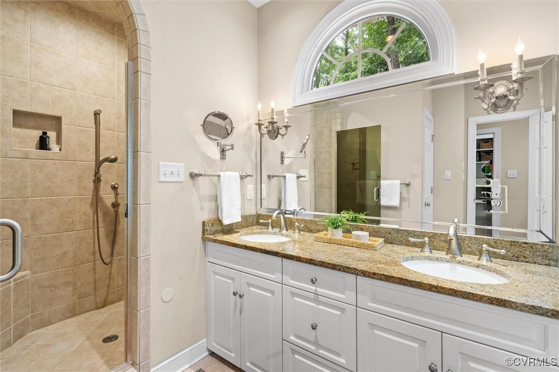 5911 Waters Edge Road Midlothian, VA 23112 - Photo 26 of 50 Full bath with a tile shower and double vanity