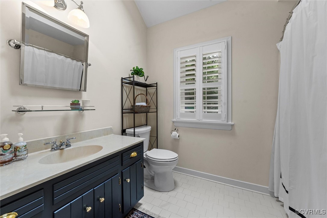 5911 Waters Edge Road Midlothian, VA 23112 - Photo 33 of 50 Full hall bathroom featuring vanity, toilet, baseb