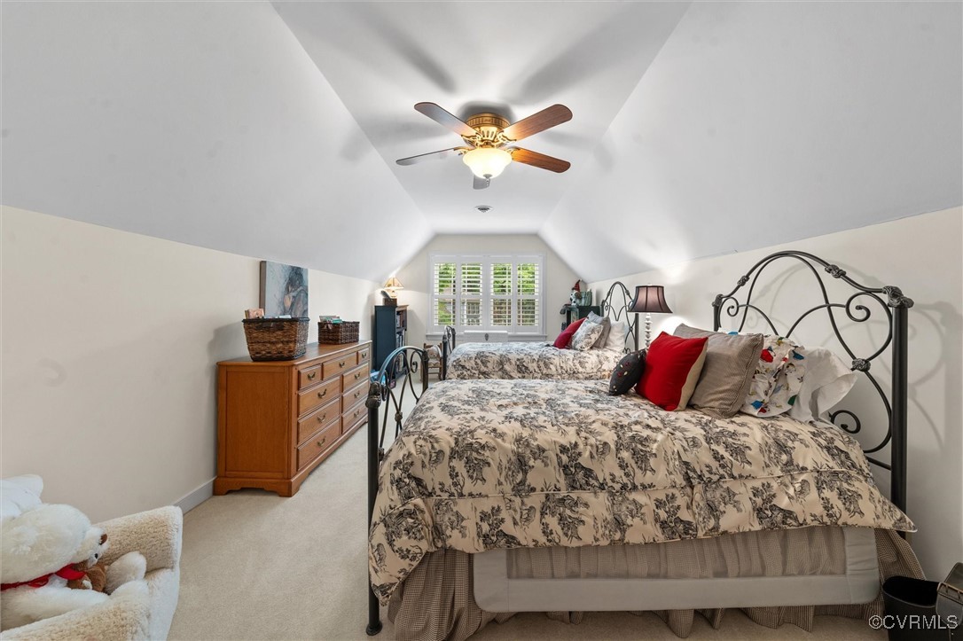 5911 Waters Edge Road Midlothian, VA 23112 - Photo 36 of 50 Bedroom with light colored carpet, vaulted ceiling
