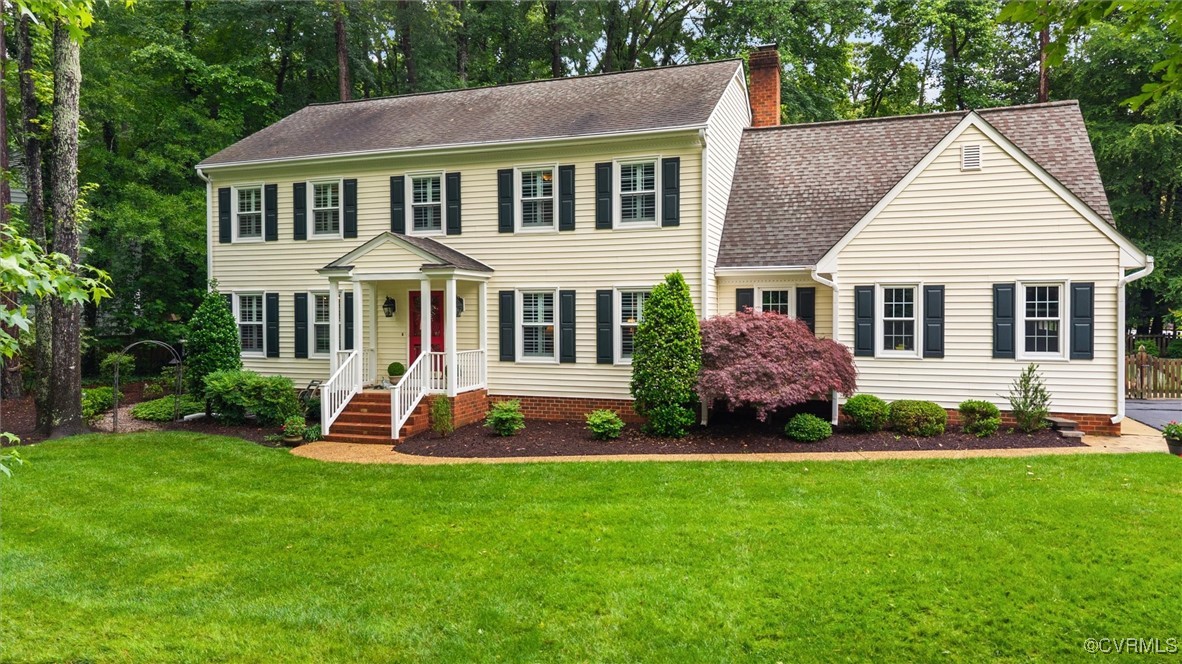 5911 Waters Edge Road Midlothian, VA 23112 - Photo 38 of 50 Colonial house with a chimney, a front lawn, and a