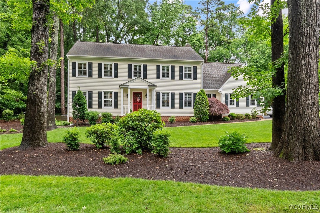 5911 Waters Edge Road Midlothian, VA 23112 - Photo 45 of 50 Colonial house with a front lawn, a chimney, and r