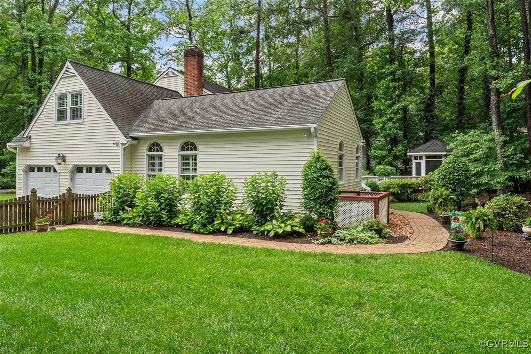 5911 Waters Edge Road Midlothian, VA 23112 - Photo 47 of 50 View of side of property with a chimney, a shingle
