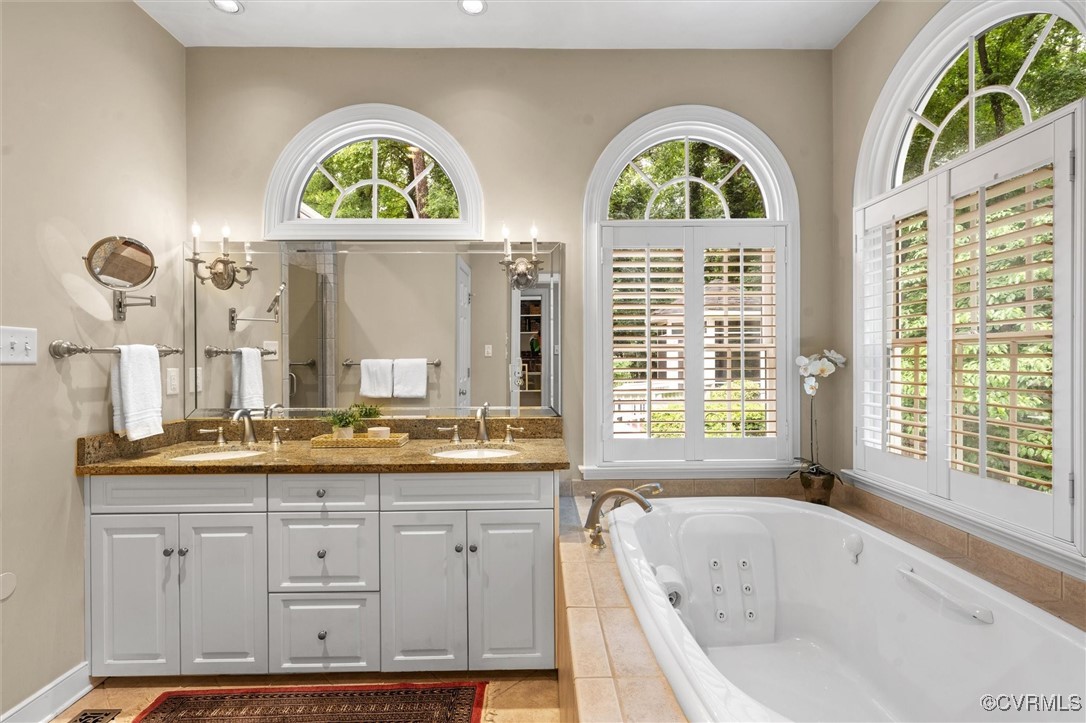 5911 Waters Edge Road Midlothian, VA 23112 - Photo 8 of 50 Bathroom featuring double vanity, a tub with jets,
