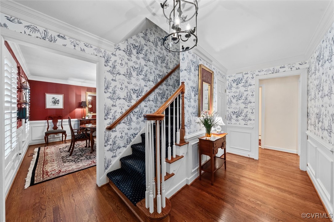 5911 Waters Edge Road Midlothian, VA 23112 - Photo 10 of 50 Foyer entrance with wallpapered walls, a chandelie
