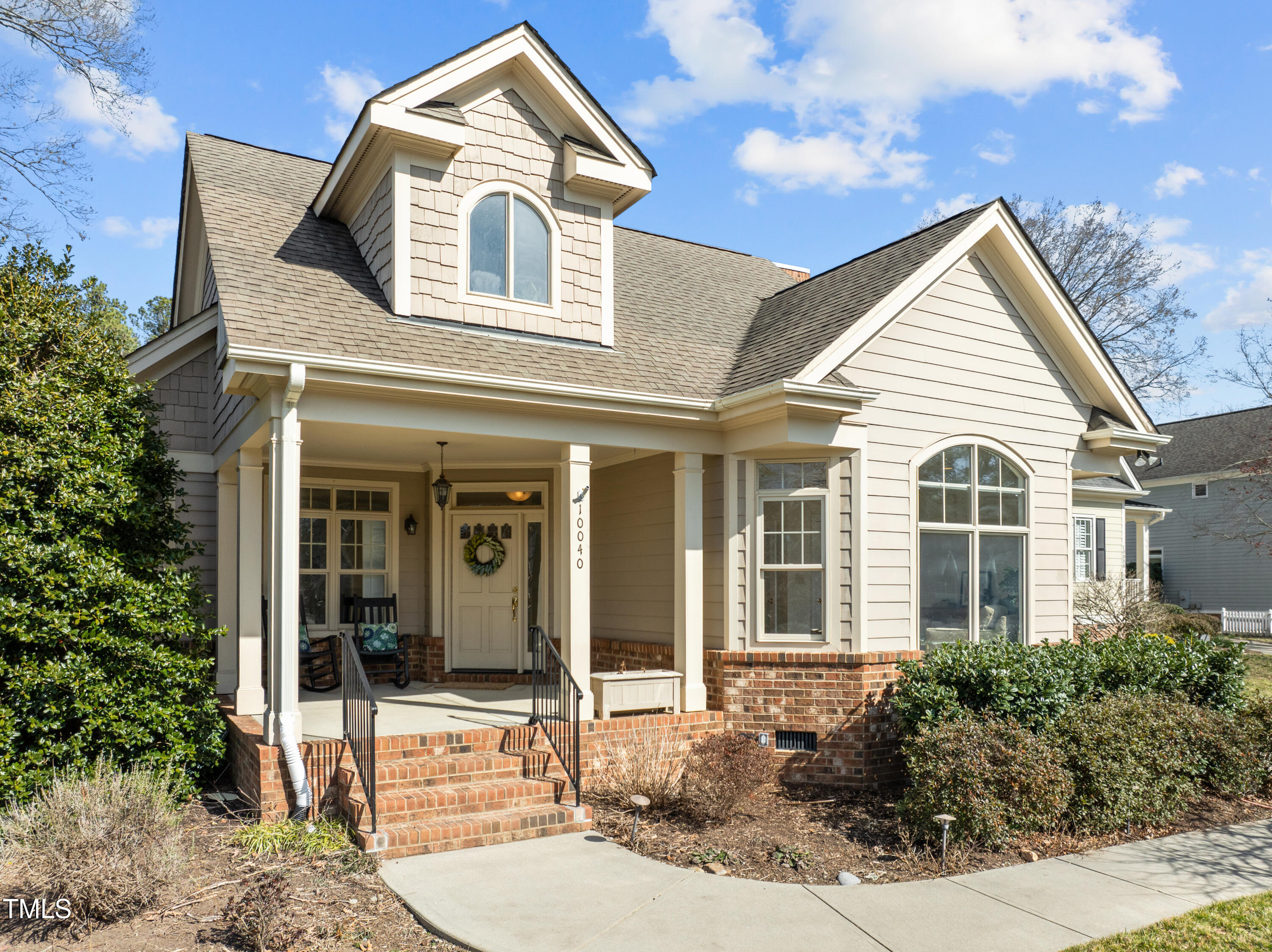 10040 Ward Chapel Hill, NC 27517 - Photo 1 of 56 front view of a house with a yard
