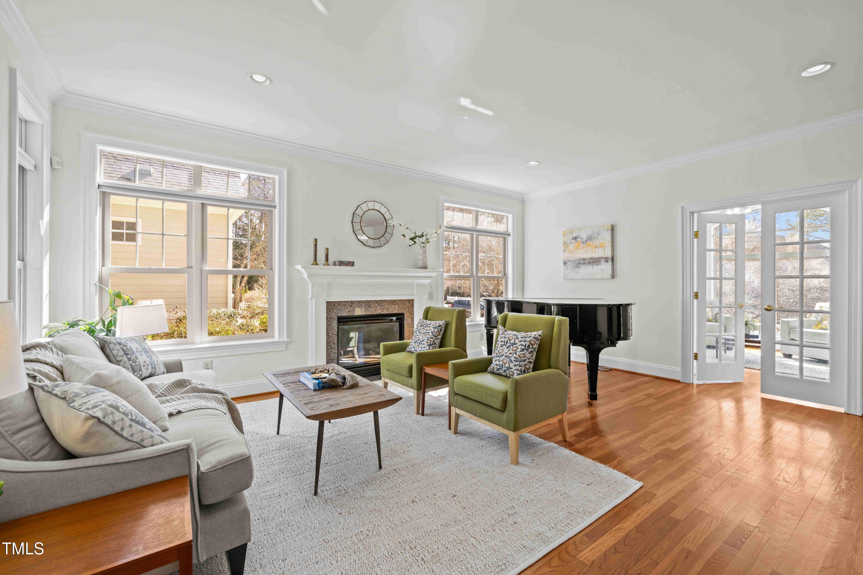 10040 Ward Chapel Hill, NC 27517 - Photo 13 of 56 a living room with furniture and a fireplace