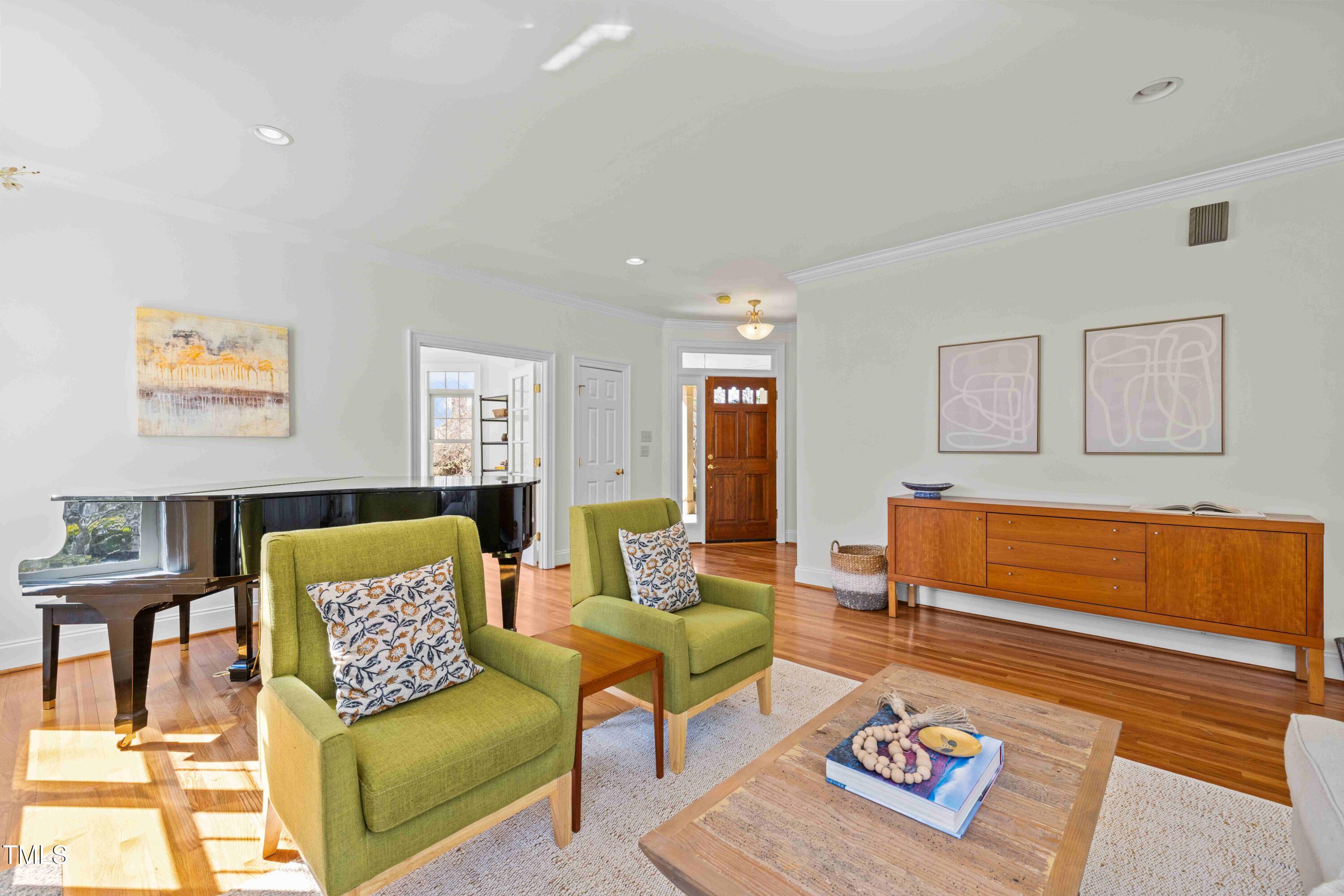 10040 Ward Chapel Hill, NC 27517 - Photo 15 of 56 a living room with furniture and a rug