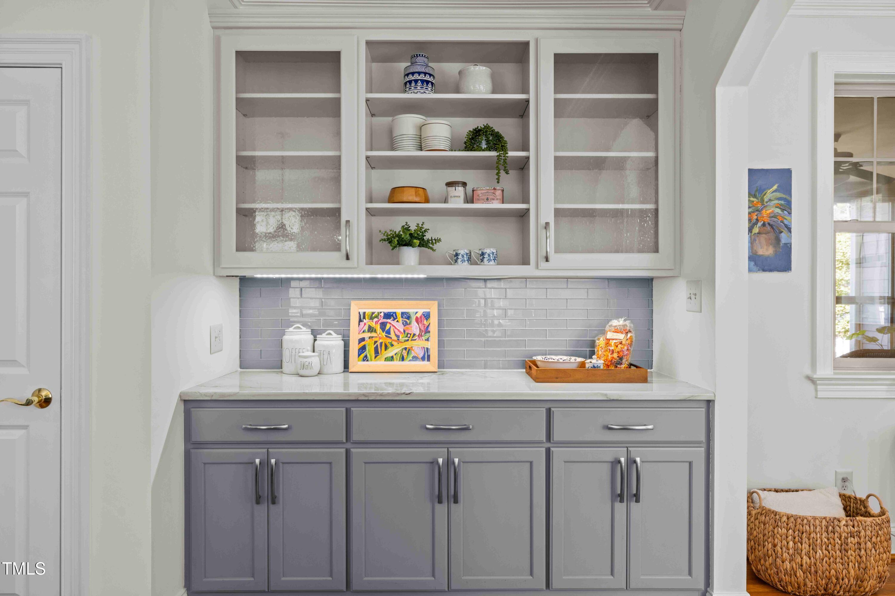 10040 Ward Chapel Hill, NC 27517 - Photo 22 of 56 a room with cabinets and window