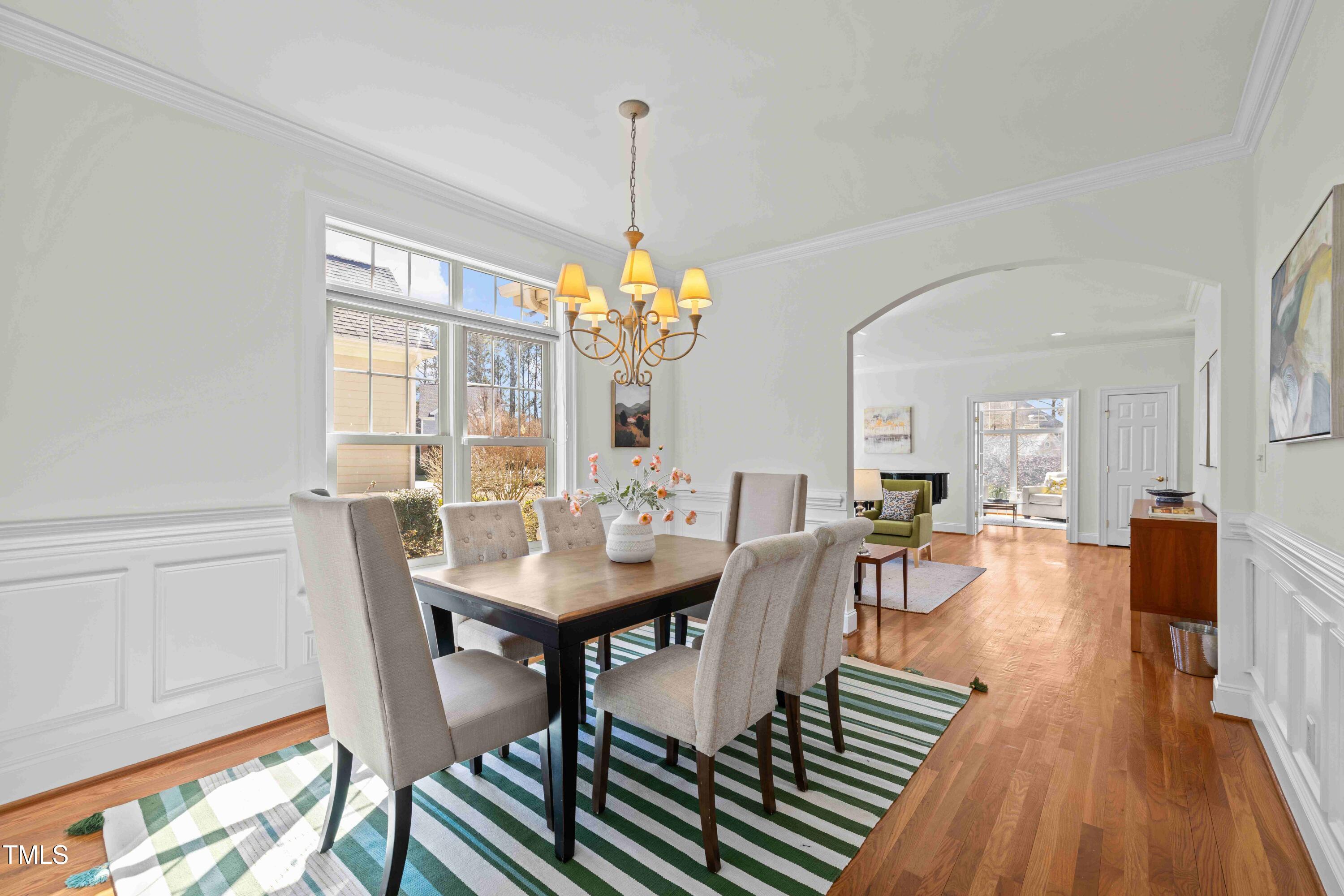 10040 Ward Chapel Hill, NC 27517 - Photo 24 of 56 a view of a dining room with furniture window and wooden floor