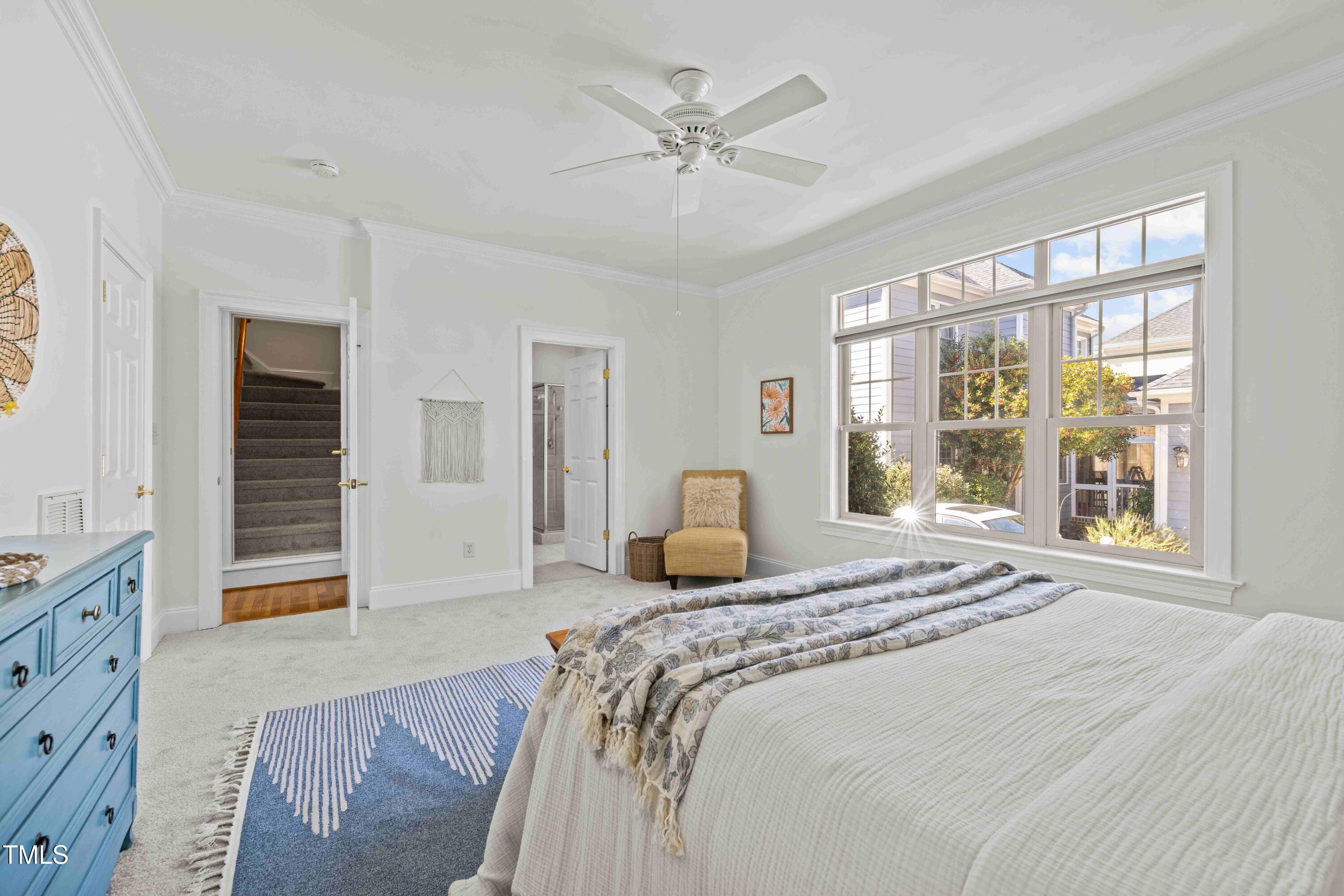 10040 Ward Chapel Hill, NC 27517 - Photo 26 of 56 a bedroom with a bed and window