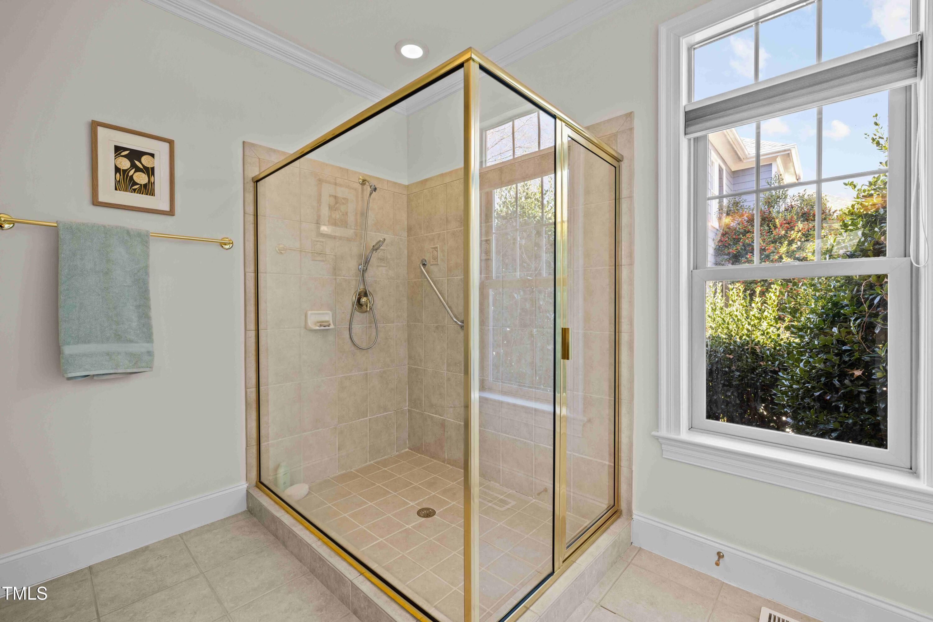 10040 Ward Chapel Hill, NC 27517 - Photo 29 of 56 a bathroom with a glass shower door