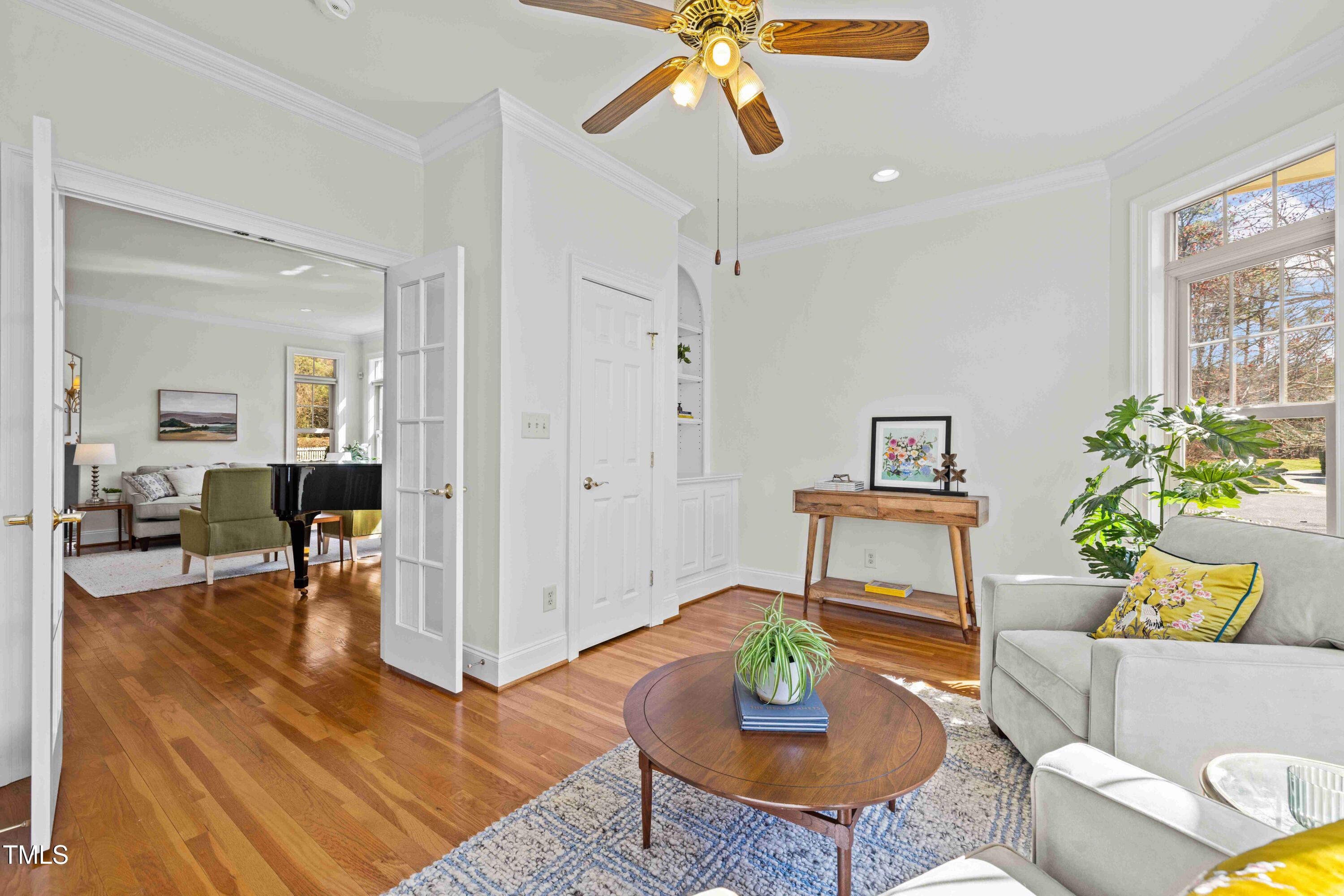10040 Ward Chapel Hill, NC 27517 - Photo 3 of 56 a living room with furniture and wooden floor