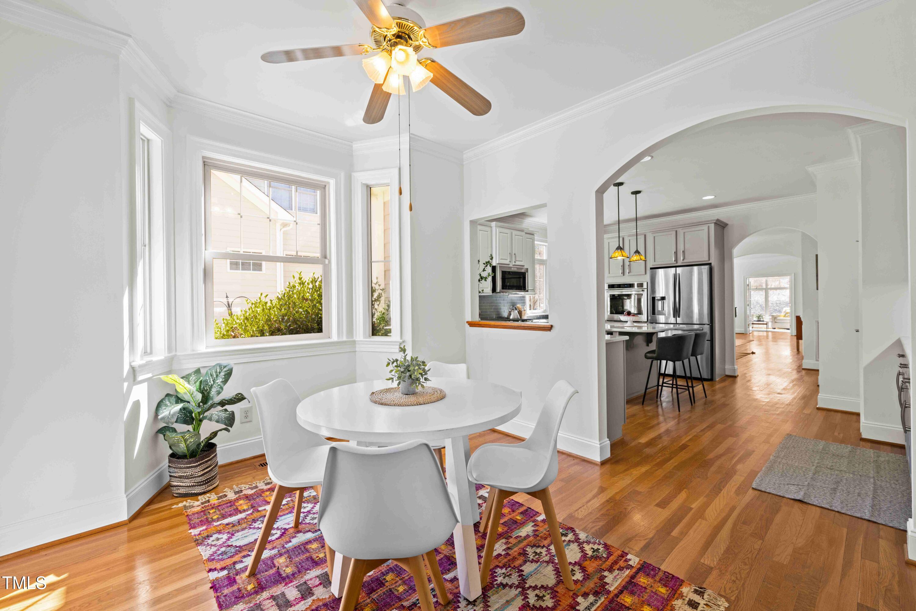 10040 Ward Chapel Hill, NC 27517 - Photo 32 of 56 a view of a dining room with furniture and wooden floor