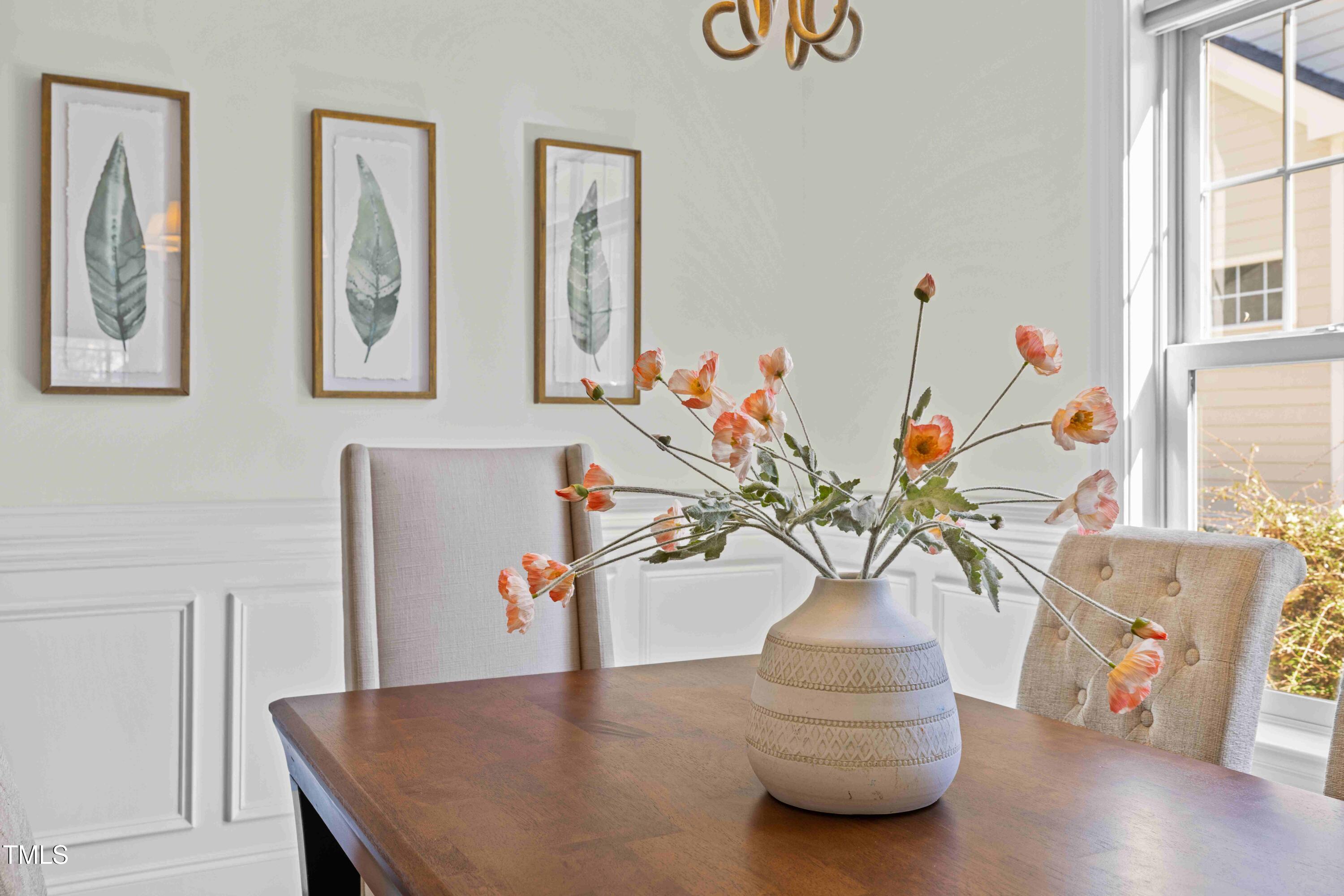 10040 Ward Chapel Hill, NC 27517 - Photo 37 of 56 a vase of flowers sitting on a table