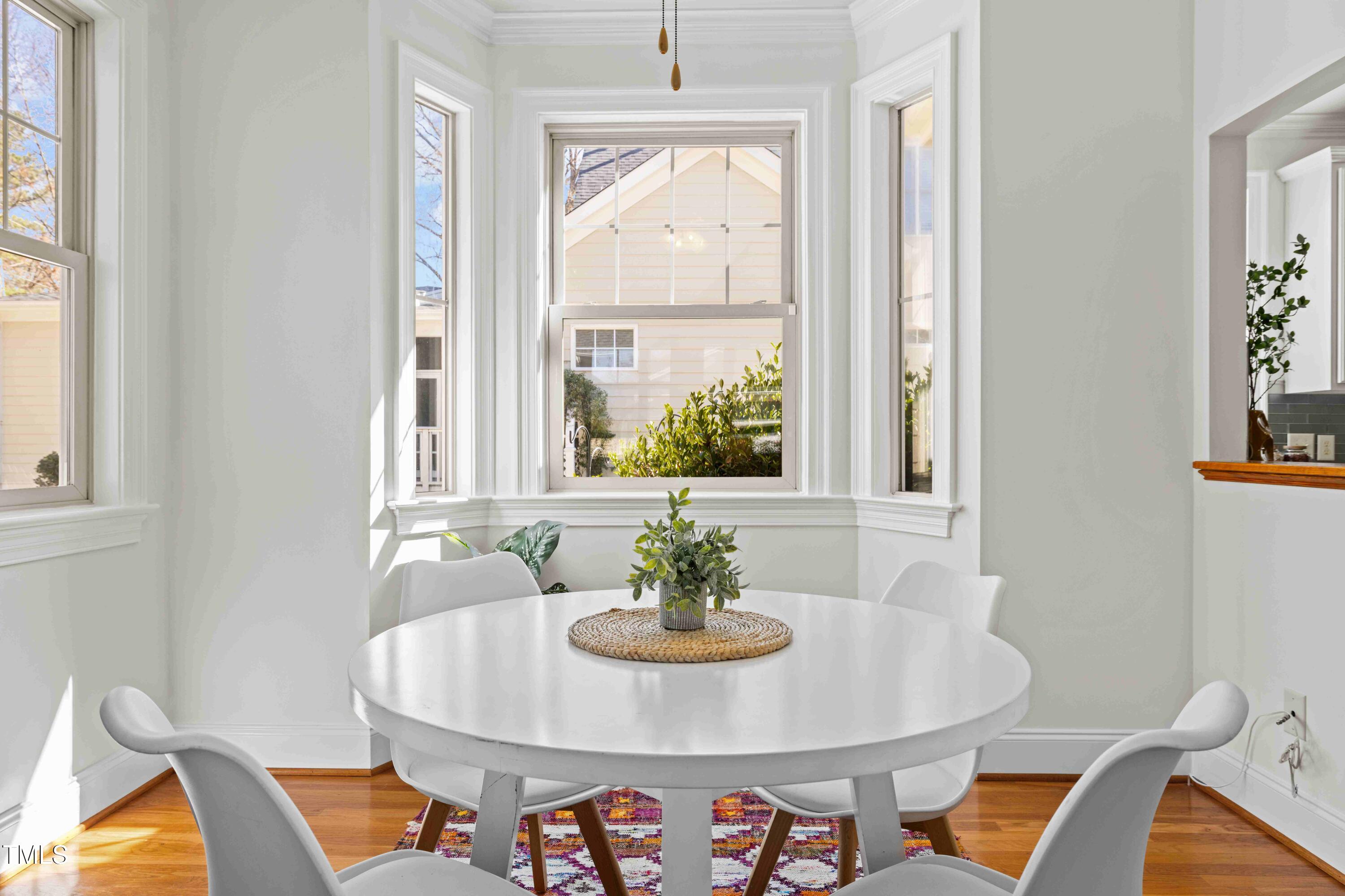 10040 Ward Chapel Hill, NC 27517 - Photo 40 of 56 a dining room with furniture and window