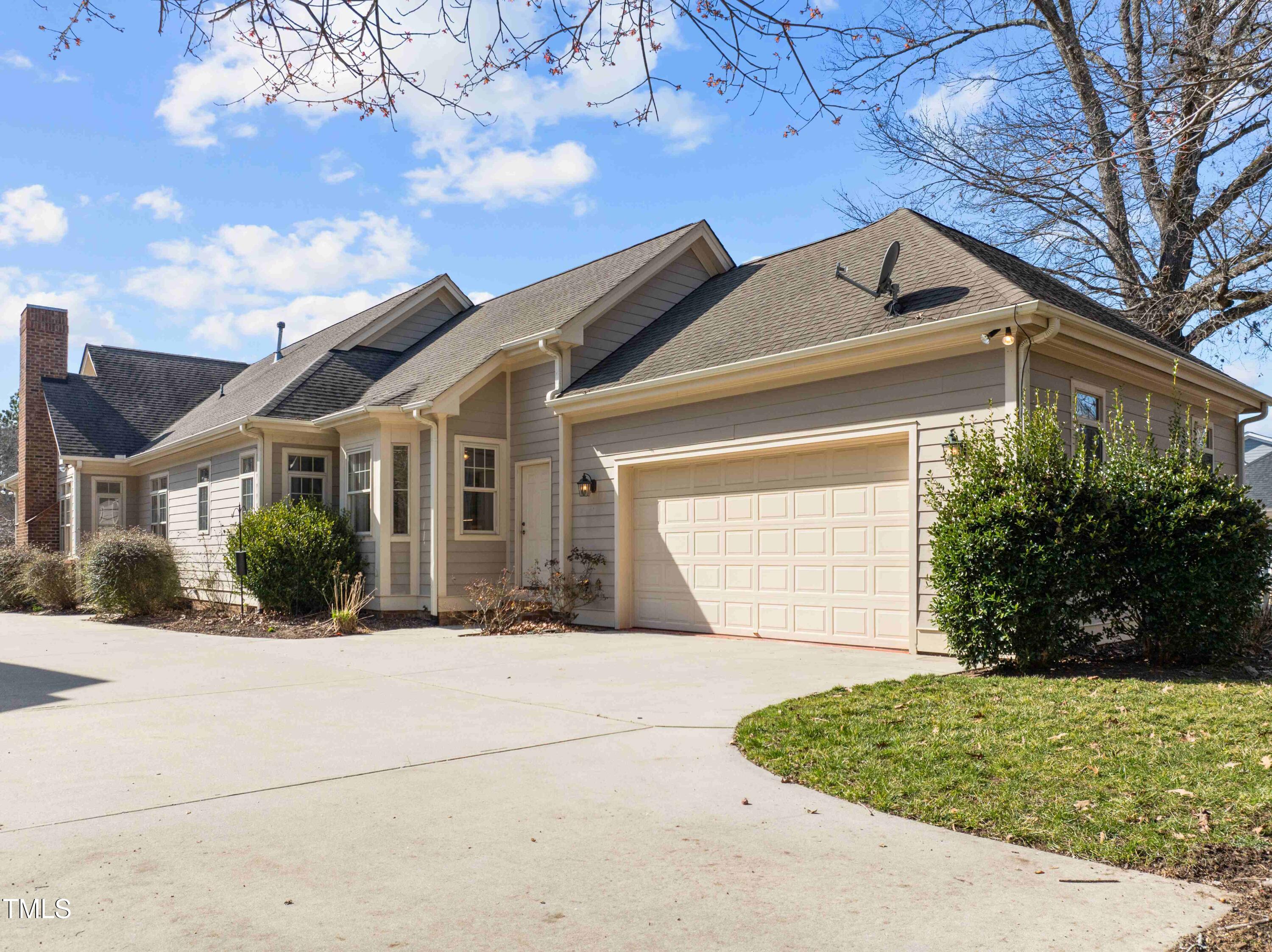 10040 Ward Chapel Hill, NC 27517 - Photo 48 of 56 a front view of a house with a yard