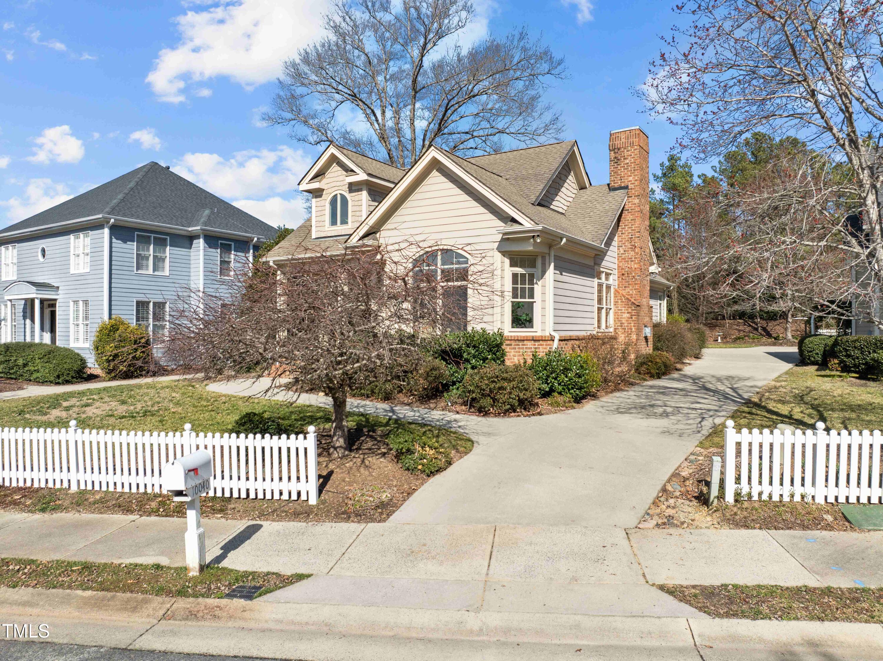 10040 Ward Chapel Hill, NC 27517 - Photo 50 of 56 a view of a house with a yard