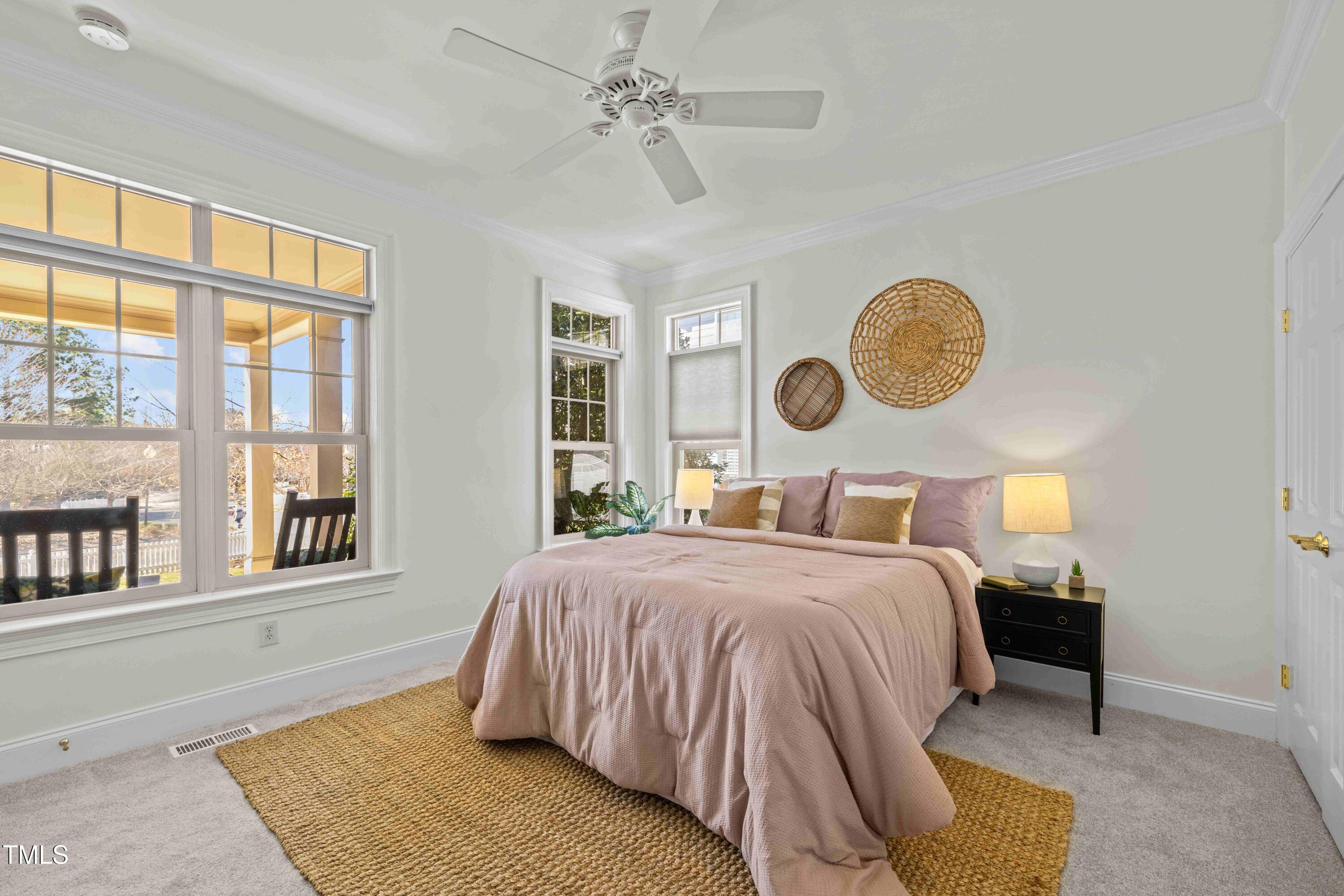 10040 Ward Chapel Hill, NC 27517 - Photo 9 of 56 a bedroom with a bed and a window