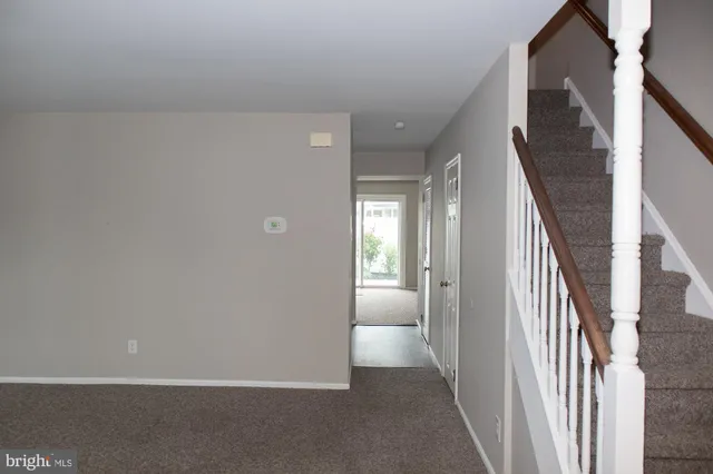 a view of an entryway with staircase