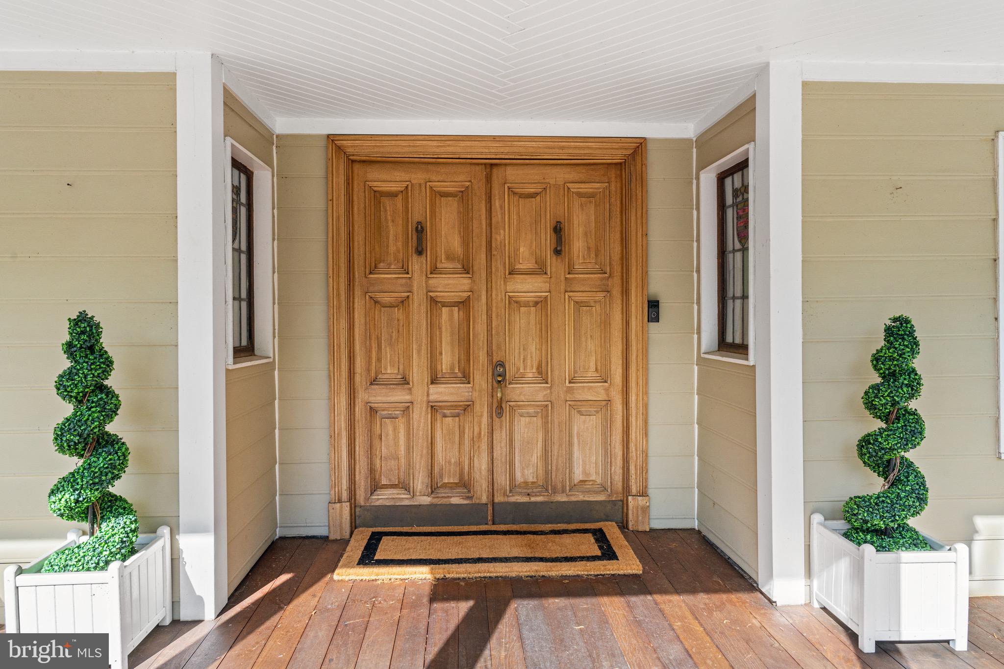 7831 Southdown Road Alexandria, VA 22308 - Photo 10 of 49 Solid wood double-door entry