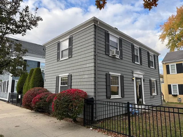 a view of a house with a balcony