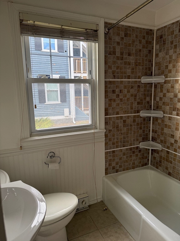 128 Boston Street, Unit 4 Salem, MA 01970 - Photo 9 of 17 a white bath tub sitting next to a white toilet