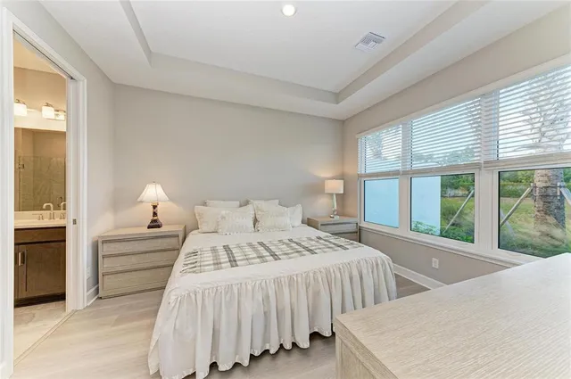 a living room with furniture and a lamp