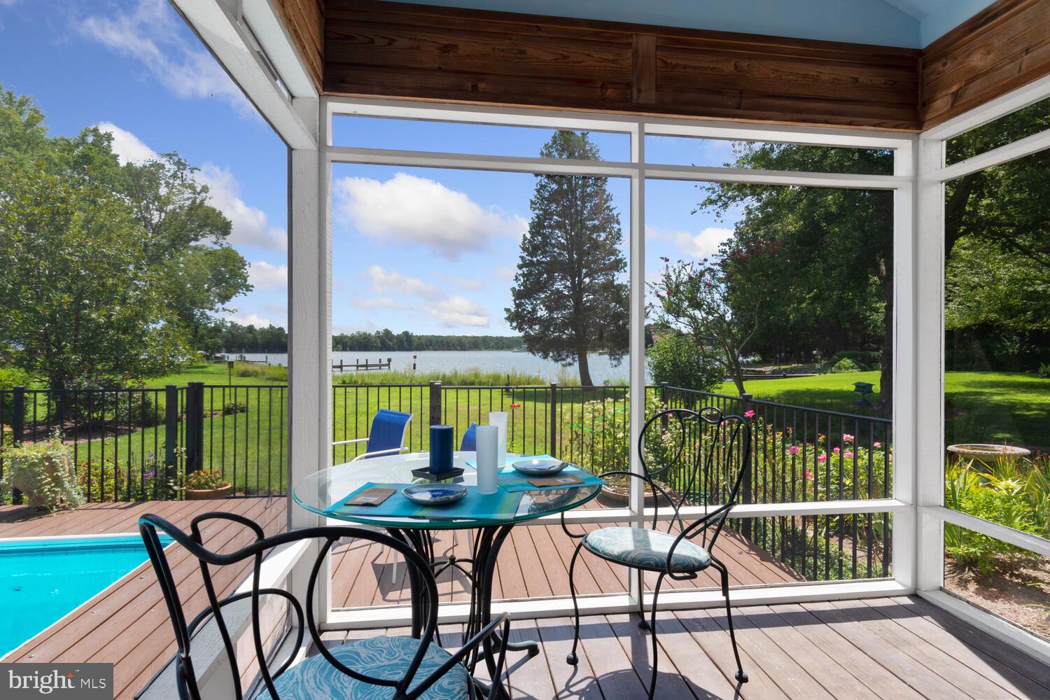 602 Cove Road St. Michaels, MD 21663 - Photo 23 of 79 Screened in porch for monring coffee.