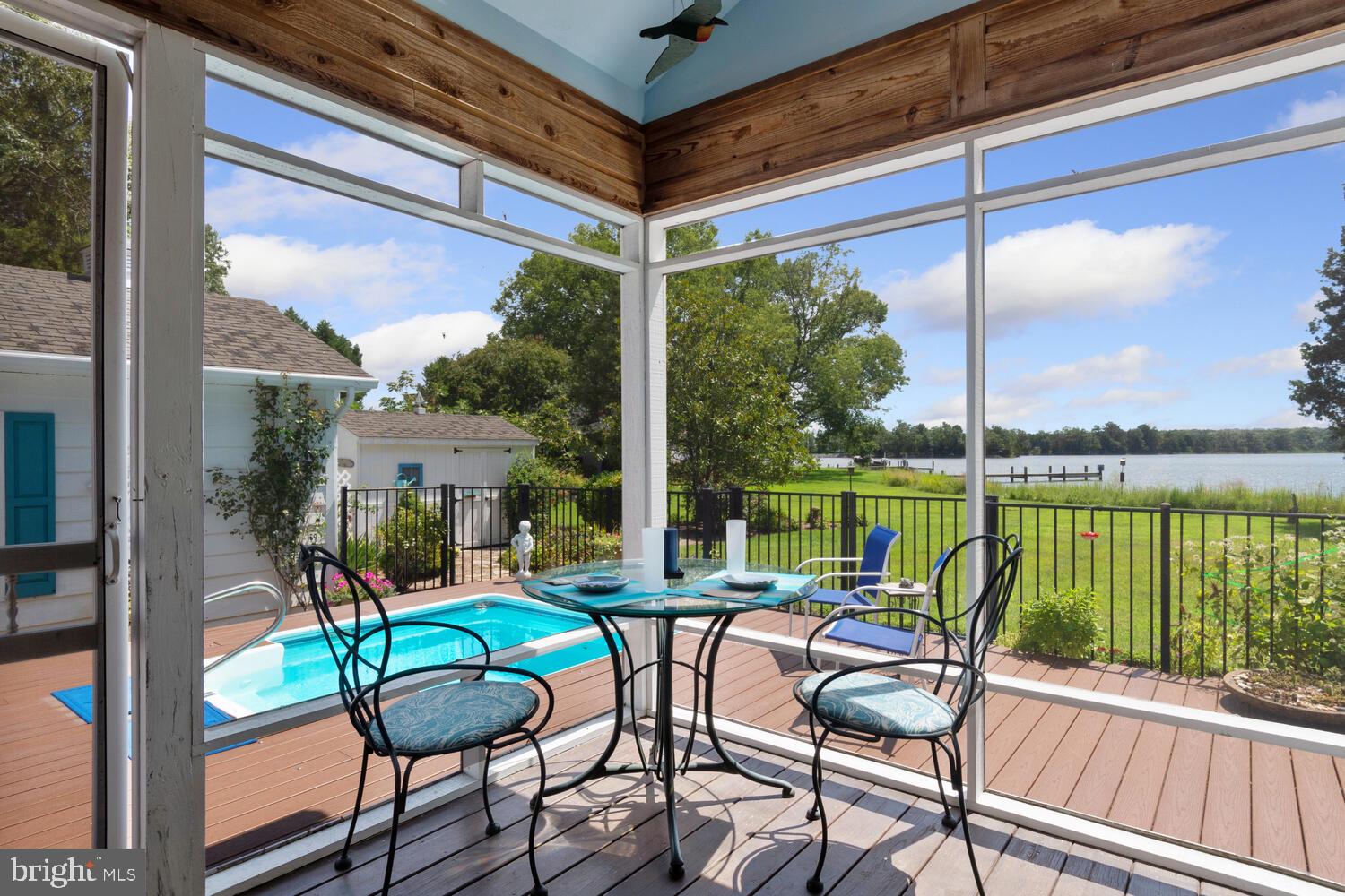 602 Cove Road St. Michaels, MD 21663 - Photo 24 of 79 Overlooking the pool and waterfront