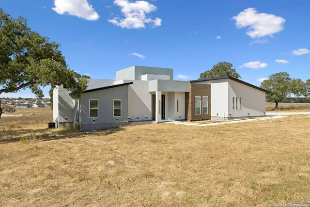 a view of a house with a patio