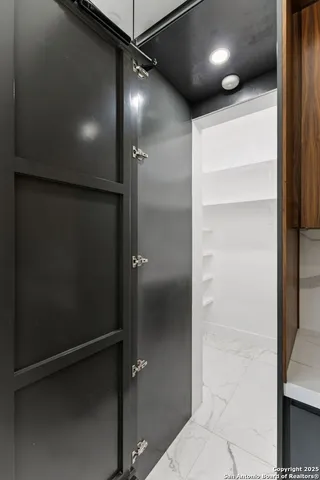 a view of a kitchen with a sink