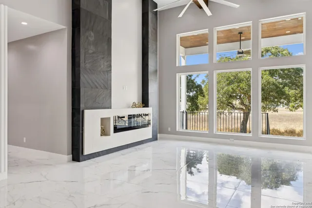 a view of a room with a large window