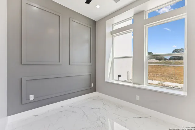 a view of an entryway with wooden floor
