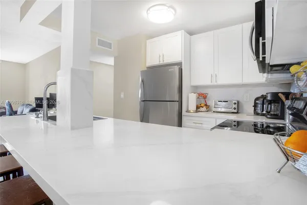 $284,999 | 9682 Fontainebleau Boulevard, Unit 503, Miami, FL 33172