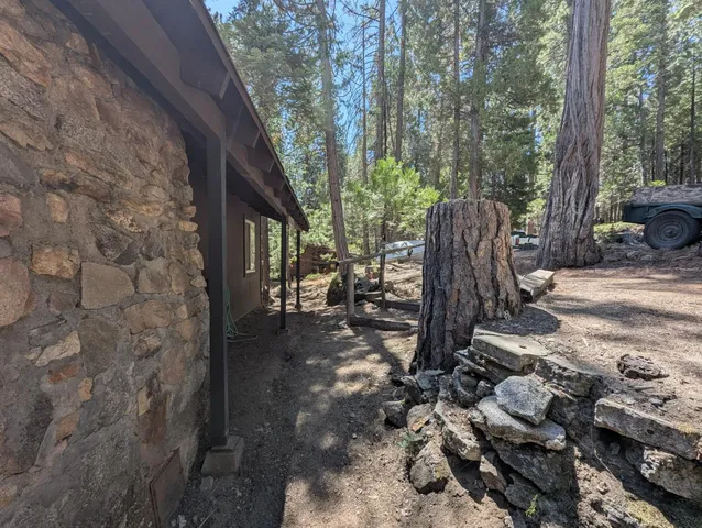 a view of a backyard with a patio