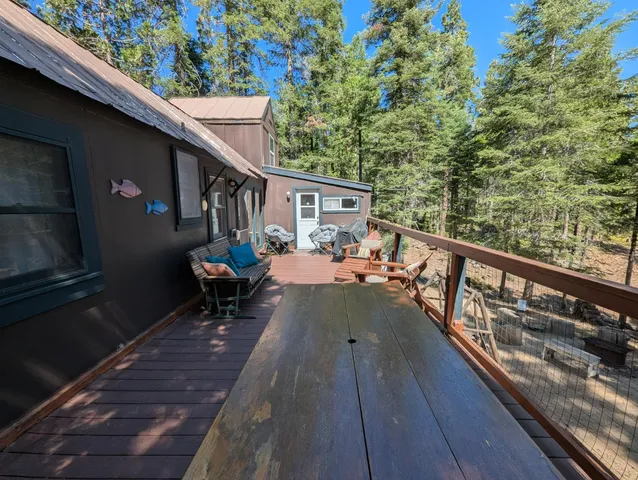 a backyard of a house with seating space