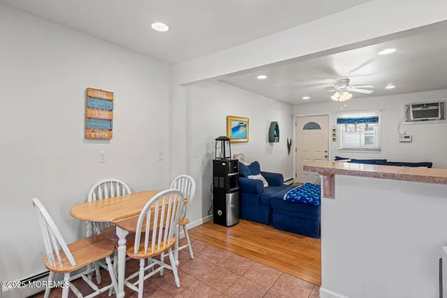 a kitchen with stainless steel appliances granite countertop a refrigerator sink and cabinets