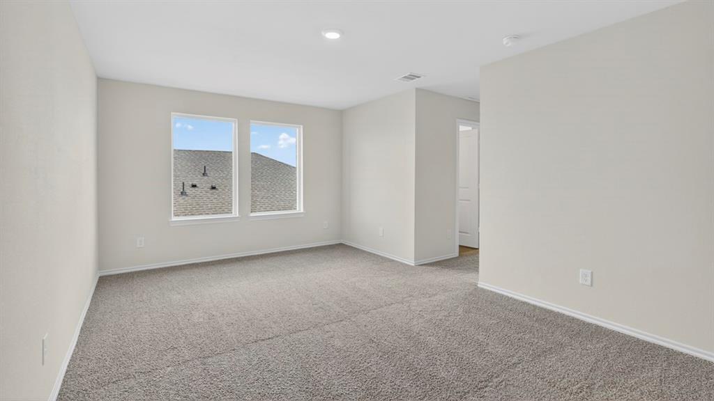 1683 Mantle Road Crandall, TX 75114 - Photo 15 of 31 Spacious room featuring neutral carpeting, light-toned walls, and recessed lighting