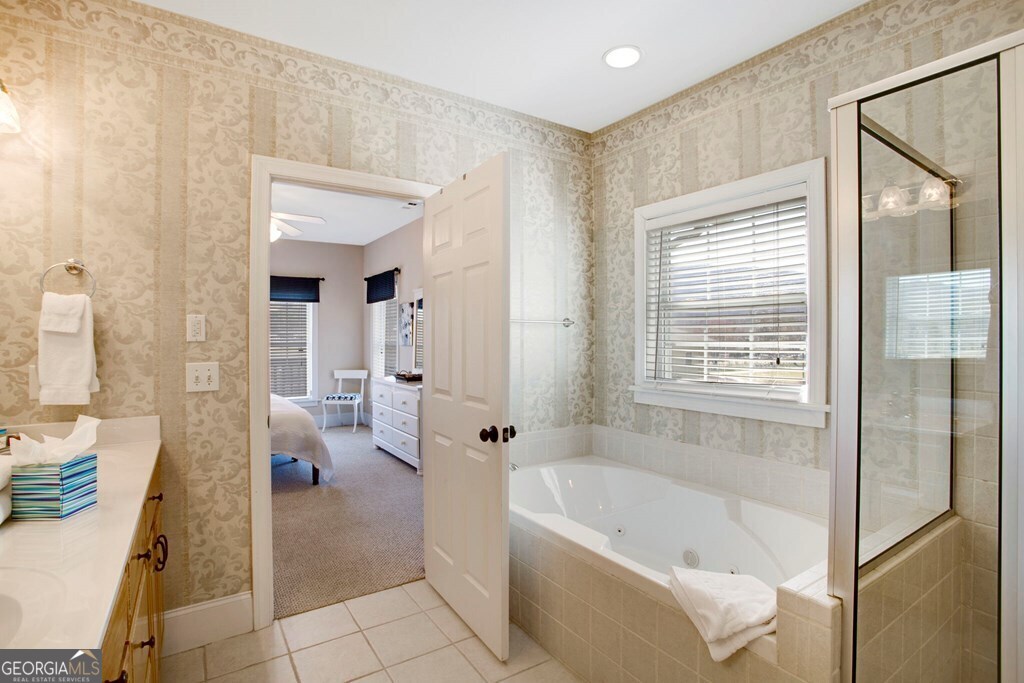 1725 Water Crest Way, Unit D Young Harris, GA 30582 - Photo 14 of 42 a bath room with a bath tub and a shower