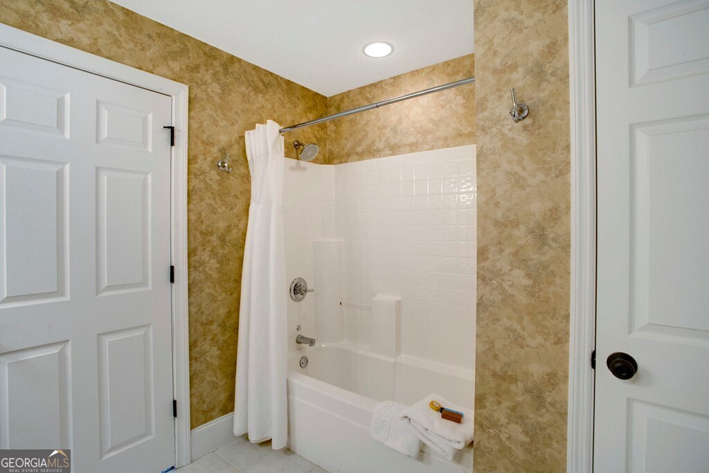 1725 Water Crest Way, Unit D Young Harris, GA 30582 - Photo 25 of 42 a bathroom with a shower and a tub