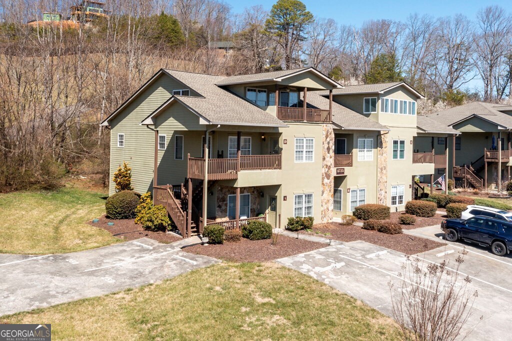 1725 Water Crest Way, Unit D Young Harris, GA 30582 - Photo 41 of 42 a view of a house with snow in the background