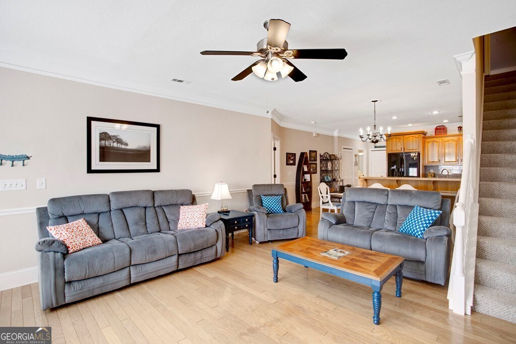1725 Water Crest Way, Unit D Young Harris, GA 30582 - Photo 5 of 42 a living room with furniture and kitchen view