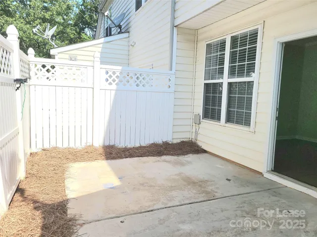 a view of backyard with a outdoor space