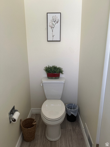 624 East Cutler Springville, UT 84663 - Photo 12 of 24 Downstairs bathroom featuring light wood-finish flooring, white baseboards, and neutral wall paint