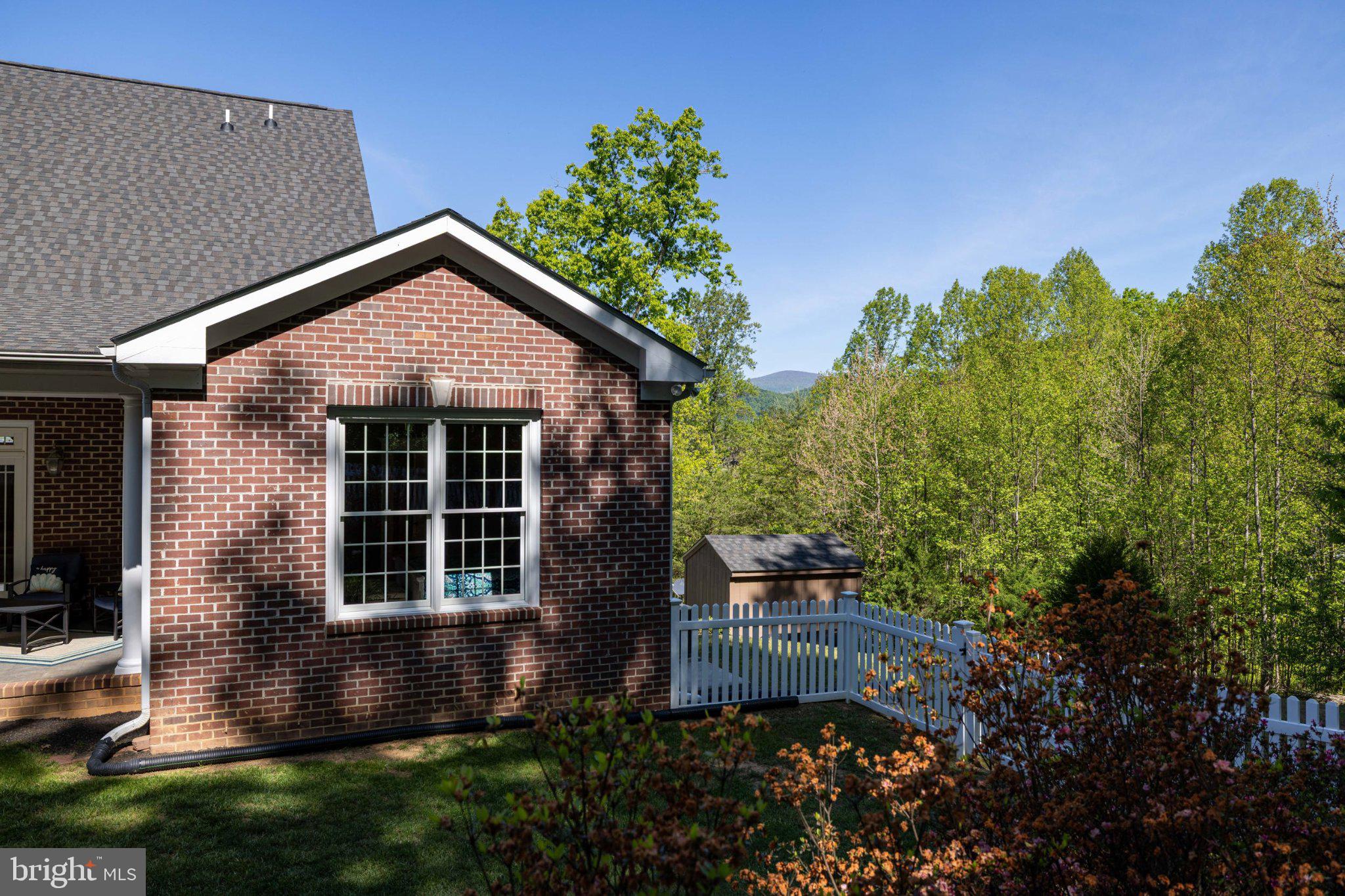 246 Lawsons Farm Circle Ruckersville, VA 22968 - Photo 102 of 130 a front view of a house with a yard