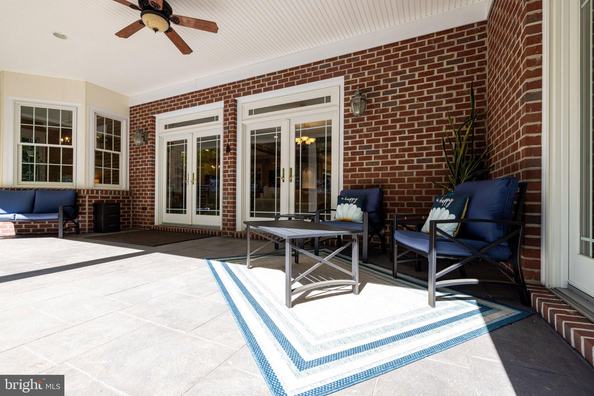 246 Lawsons Farm Circle Ruckersville, VA 22968 - Photo 103 of 130 a building outdoor space with patio furniture and windows
